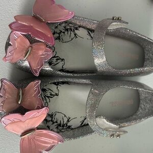 Two pairs of beautiful girls shoes.